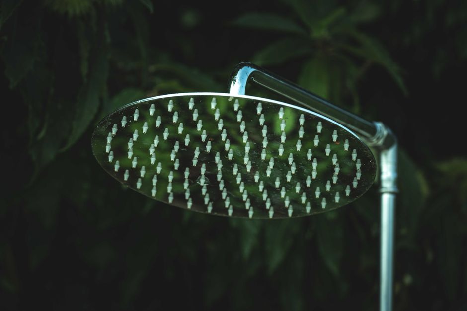 Rainfall shower head in a custom walk-in shower