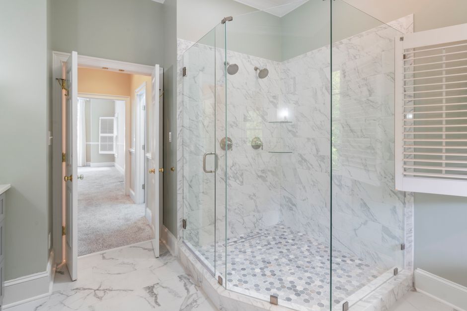 Frameless glass shower door installation