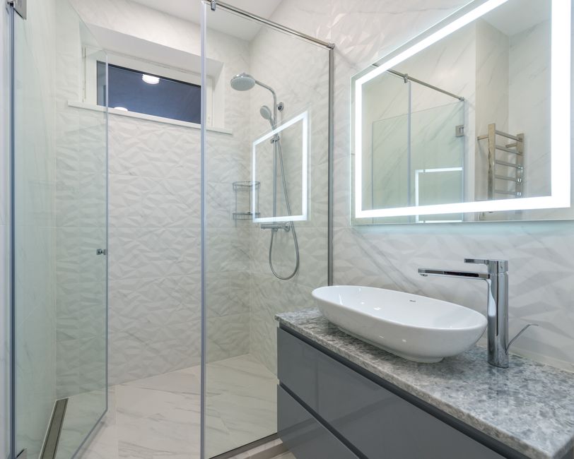 Modern walk in shower design with elegant fixtures